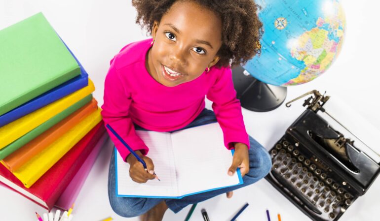 girl-writing-notebook-studio